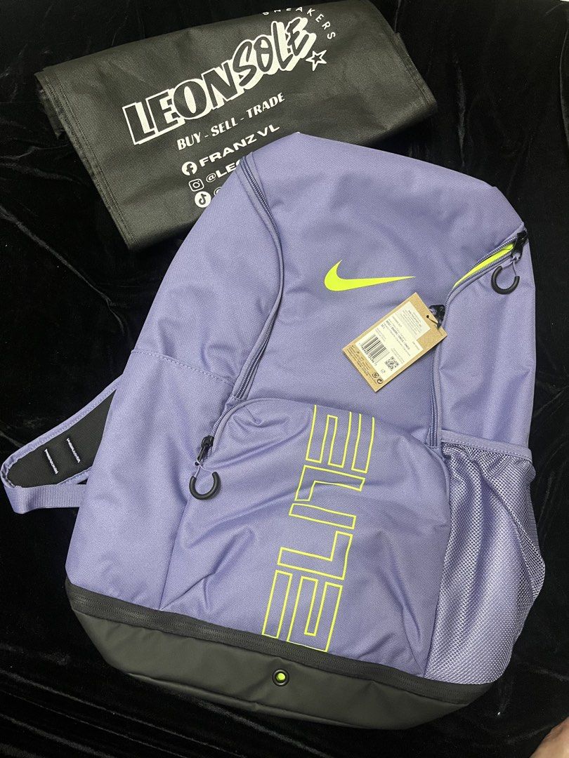 Nike Elite Bag V3 (Category: Backpacks) located in Quezon City. Submitted by leonsol3 (Listing ID 1466336604, Image 1). Description: - Brand new with original retail tags attached - Striking purple colorway with bright lime green branding and vertical ELITE lettering - Comfortable padded Max Air shoulder straps built for heavy gear loads - Convenient mesh side pockets for water bottles - Dedicated bottom compartment for extra storage or shoes 📍Q