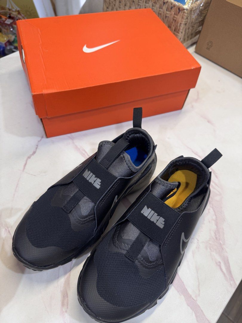 Nike Flex Runner 2 GS Black Flat Pewter (Category: Sneakers) located in San Juan City. Submitted by khaye1123 (Listing ID 1466160163, Image 2). Description: - Brand: Nike - Model: Flex Runner 2 GS - Color: Black and Flat Pewter Anthracite - Size: UK 3 / BR 34 / EUR 35.5 / CM 22.5 - Design: Slip-on with a wide branded strap and pull tabs for easy wear - Inclusions: Comes with original orange Nike shoebox - Condition: Excellent / Well-maintained.