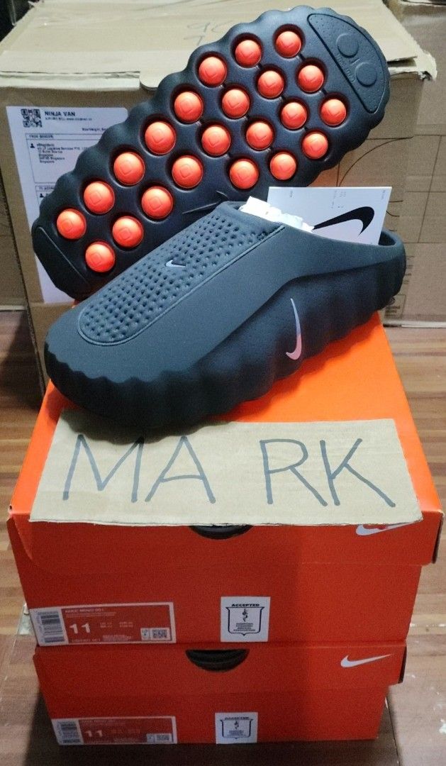 Nike Mind 001 Slides 'Black Chrome' Size 11 (Category: Slippers & Slides) located in Manila. Submitted by 25markiboy (Listing ID 1466234043, Image 1). Description: - Brand: Nike Mind 001 Slides - Color: Black Chrome - Size: 11 US - Condition: Brand new, never worn, fresh out of the box - Design: Perforated upper with small Nike swoosh branding - Outsole: Unique nubbed design featuring bright orange massage-like nodes - Inclusions: Complete with o