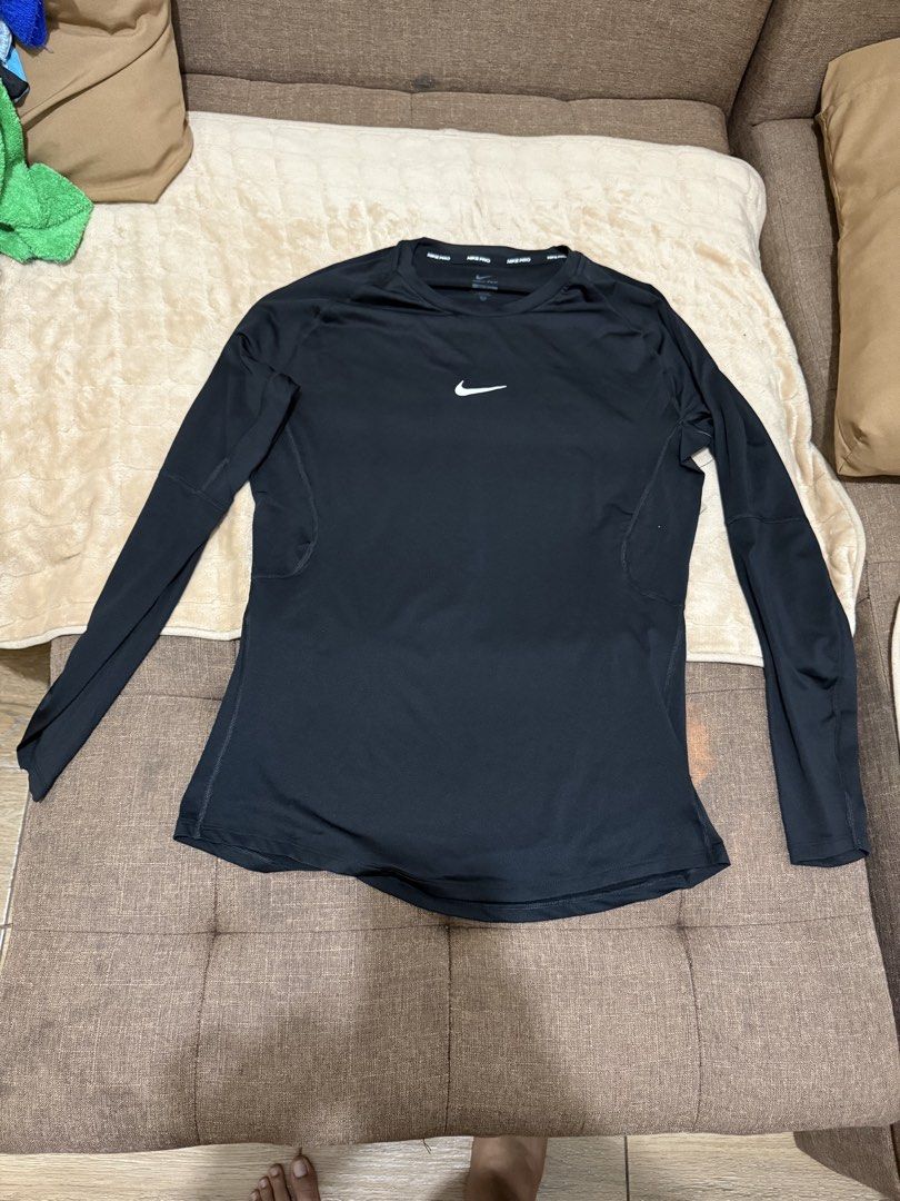 Nike Pro Long Sleeve Compression Top Black Tight Fit Large (Category: Activewear) located in Santa Cruz. Submitted by rexhalili24 (Listing ID 1466327798, Image 1). Description: - Brand New: Nike Pro - Item: Long sleeve compression top - Color: Black with white swoosh - Condition: Brand new with tags attached - Material: Dri-FIT (sweat-wicking and keeps you dry) - Details: Nike Pro branding on inner and back collar - Ideal for: Gym, running, and a