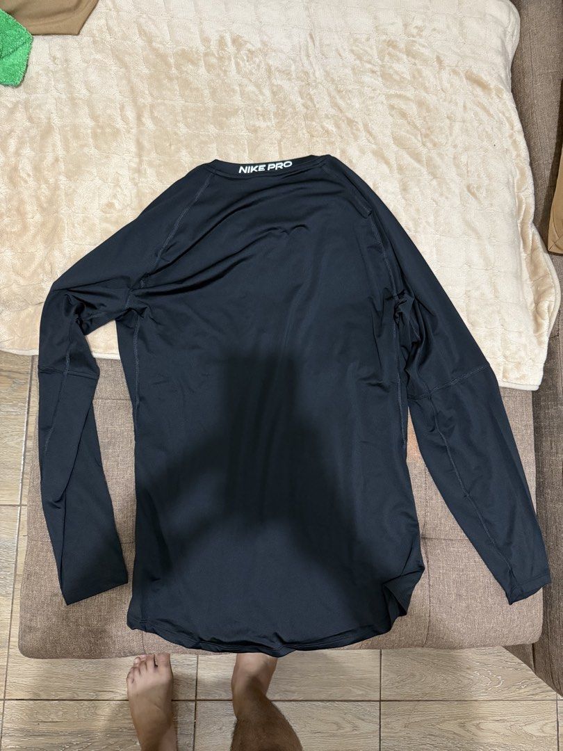 Nike Pro Long Sleeve Compression Top Black Tight Fit Large (Category: Activewear) located in Santa Cruz. Submitted by rexhalili24 (Listing ID 1466327798, Image 3). Description: - Brand New: Nike Pro - Item: Long sleeve compression top - Color: Black with white swoosh - Condition: Brand new with tags attached - Material: Dri-FIT (sweat-wicking and keeps you dry) - Details: Nike Pro branding on inner and back collar - Ideal for: Gym, running, and a