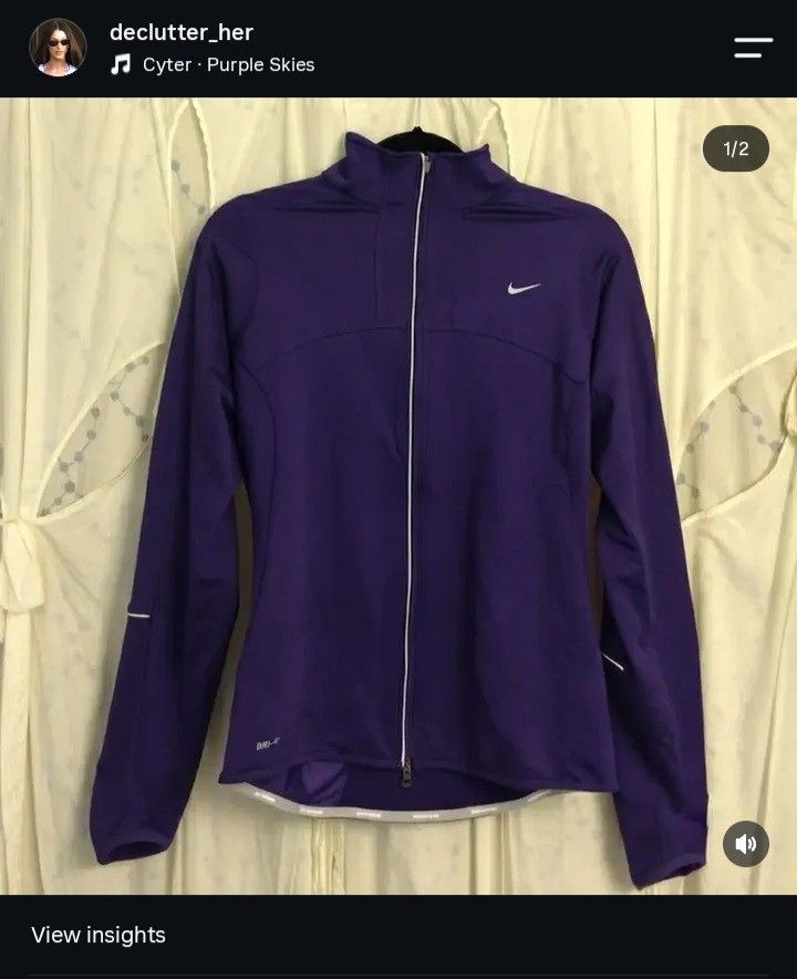 Nike Purple Dri-FIT Athletic Zip Jacket (Category: Coats, Jackets and Outerwear) located in Barcelona. Submitted by merewifx (Listing ID 1466204684, Image 1). Description: - Brand: Nike - Style: Full-zip athletic jacket / running top - Color: Purple with white Swoosh logo - Material: Dri-FIT technology for moisture control - Features: High collar, reflective piping, long sleeves with thumb holes - Ideal for: Chilly mornings, outdoor training, and