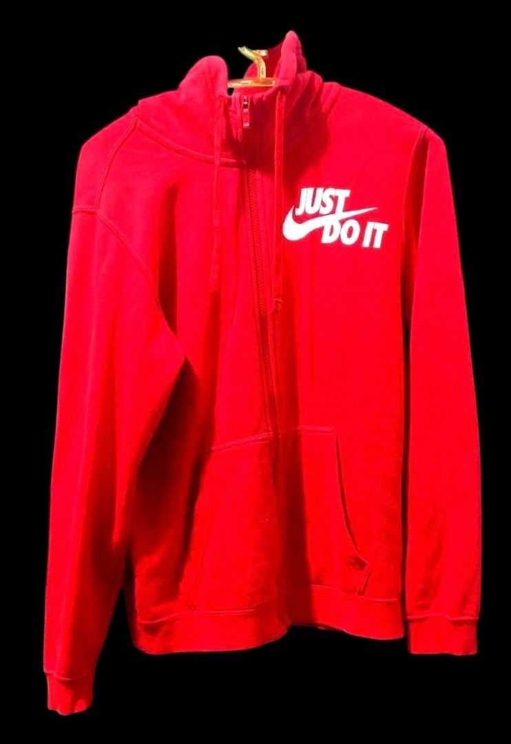 Nike Red Just Do It Full Zip Hoodie (Category: Hoodies) located in Camiling. Submitted by sundot_kalikot (Listing ID 1466326405, Image 1). Description: - Color: Bright red with white 'Just Do It' logo - Material: Soft fleece interior for extra warmth - Features: Full front zipper, high collar with adjustable drawstrings, and split kangaroo pockets - Fit: Standard fit with ribbed cuffs and hem for a snug feel - Condition: Great for casual days or 