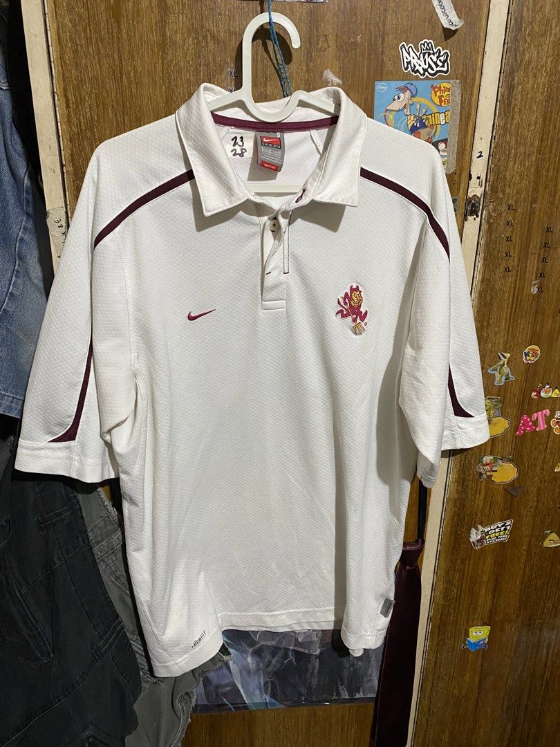 Nike Team ASU Sun Devils Polo Shirt (Category: Tshirts & Polo Shirts ) located in Imus. Submitted by frootiloots4103 (Listing ID 1466209365, Image 1). Description: - Brand: Nike - Team: ASU Sun Devils (Pitchfork mascot embroidered on chest) - Color: White with maroon accents - Technology: Nike FIT dry fabric - Details: Nike swoosh on right chest, authentic tag on lower hem - Size: Small 23x28 - Origin: Made in Indonesia - Condition: Clean piece w