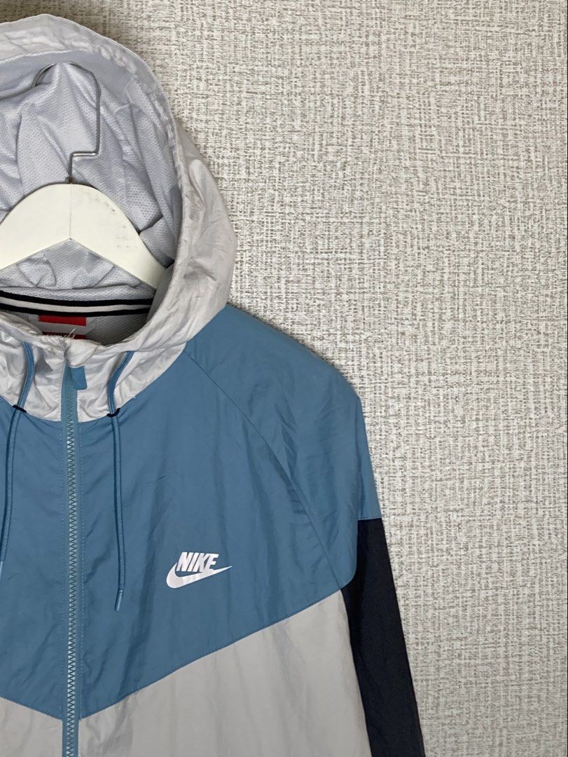 Nike Tritone Windbreaker (Category: Coats, Jackets and Outerwear) located in Manila. Submitted by drip_n_drop (Listing ID 1466293421, Image 2). Description: Size: 2XL on Tag Color Rate: 9/10 Dimensions: 24W x 29L Issues: small stitch on ribbings Needs Wash DM for more details.
