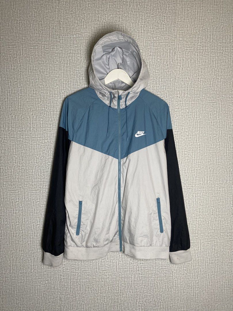 Nike Tritone Windbreaker (Category: Coats, Jackets and Outerwear) located in Manila. Submitted by drip_n_drop (Listing ID 1466293421, Image 1). Description: Size: 2XL on Tag Color Rate: 9/10 Dimensions: 24W x 29L Issues: small stitch on ribbings Needs Wash DM for more details.