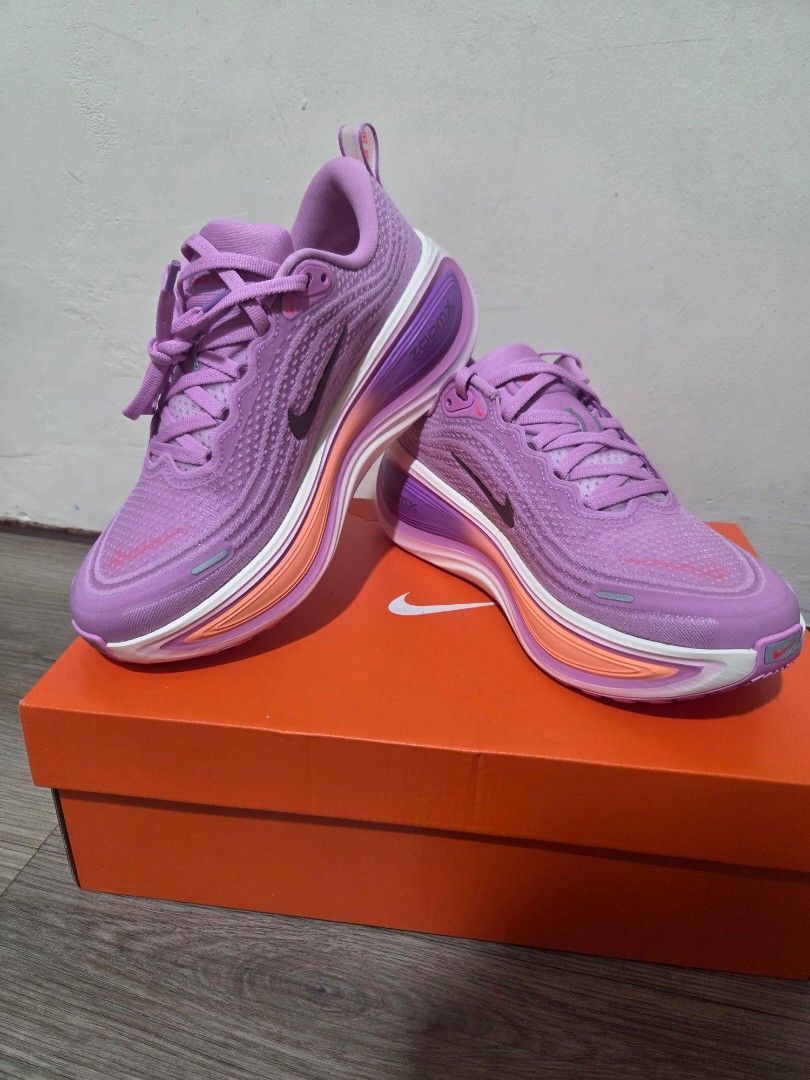 Nike Vomero Plus (Category: Sneakers) located in Makati City. Submitted by zealfire.ce9311 (Listing ID 1466223720, Image 2). Description: Brand new Nike Vomero Plus in light magenta, black, and pink (Women's US 7 / UK 5 / EUR 38). Features a ZoomX foam midsole with a vibrant purple and orange gradient, plus a textured mesh upper with tonal branding. Comes in the original orange Nike shoebox. Perfect for running and lifestyle wear! Bought it in US