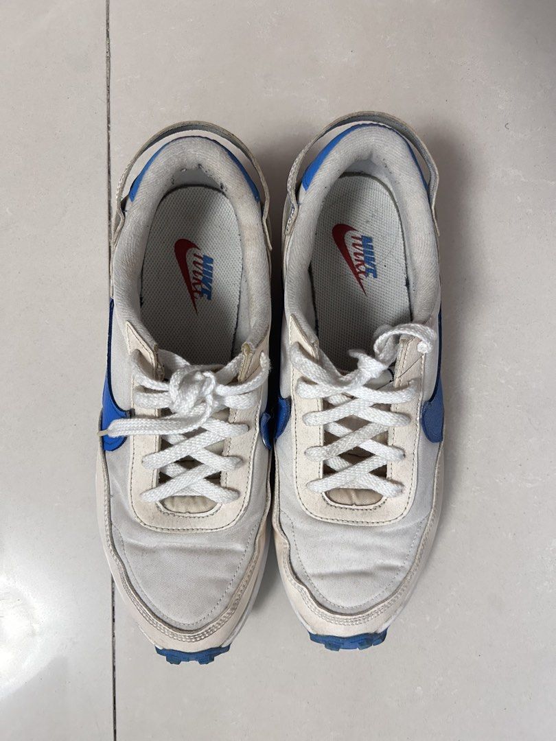 Nike Waffle Sneakers (Category: Sneakers) located in Manila. Submitted by bechaydeclutter (Listing ID 1466157524, Image 2). Description: Nike Tom Sachs General Purpose Shoe in the light cream and blue colorway. White canvas upper with royal blue swooshes, red accents on the waffle outsole, and blue heel pull tabs. Orange insoles with classic Nike branding. Worn previously with normal creases and dirt marks on the midsoles and uppers. Classic casu