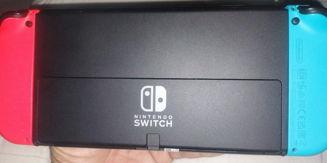 Nintendo switch Oled (Category: Nintendo) located in Manila. Submitted by youngfire_a83b3d (Listing ID 1466239472, Image 3). Description: FS Nintendo Switch Oled "Jailbreak"with complete package and box 125gb SD card isasama kona din ung monitor sa package para kapag gusto mo sa malaking monitor maglaro with 9games Mortal Combat 11 One Piece 4 Bayonetta 3 Dragon Ball sparkling zero Demon slayer the hinokami chronicles Assassin's Creed the rebel c