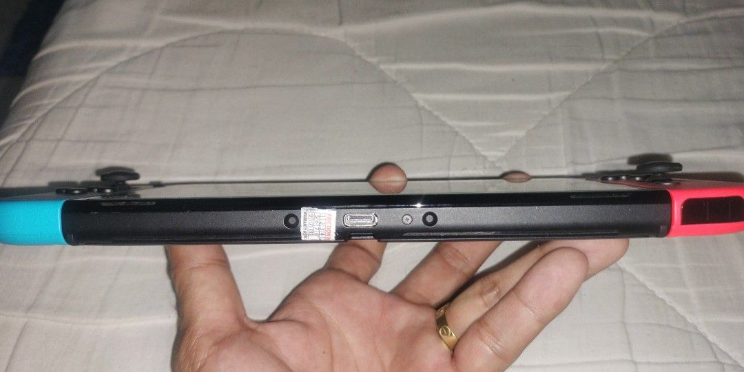 Nintendo switch Oled (Category: Nintendo) located in Manila. Submitted by youngfire_a83b3d (Listing ID 1466239472, Image 2). Description: FS Nintendo Switch Oled "Jailbreak"with complete package and box 125gb SD card isasama kona din ung monitor sa package para kapag gusto mo sa malaking monitor maglaro with 9games Mortal Combat 11 One Piece 4 Bayonetta 3 Dragon Ball sparkling zero Demon slayer the hinokami chronicles Assassin's Creed the rebel c