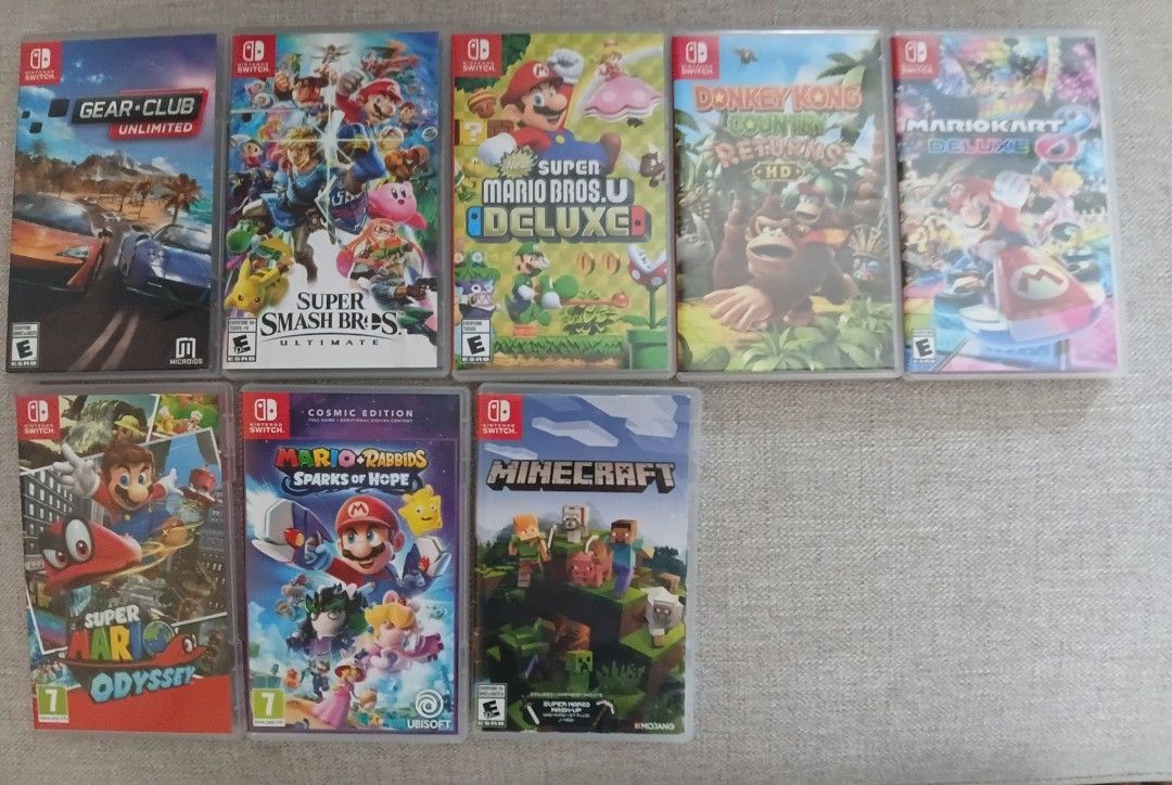 Nintendo Switch physical game cartridge bundle (Category: Nintendo) located in Makati City. Submitted by ollie.q (Listing ID 1466221551, Image 1). Description: - Authentic Nintendo Switch physical games (8 titles available) - Includes: Super Mario Odyssey, Super Smash Bros Ultimate, Minecraft, Mario Kart 8 Deluxe, New Super Mario Bros U Deluxe, Mario + Rabbids Sparks of Hope, Donkey Kong Country Returns HD, and Gear.Club Unlimited - Condition: Al
