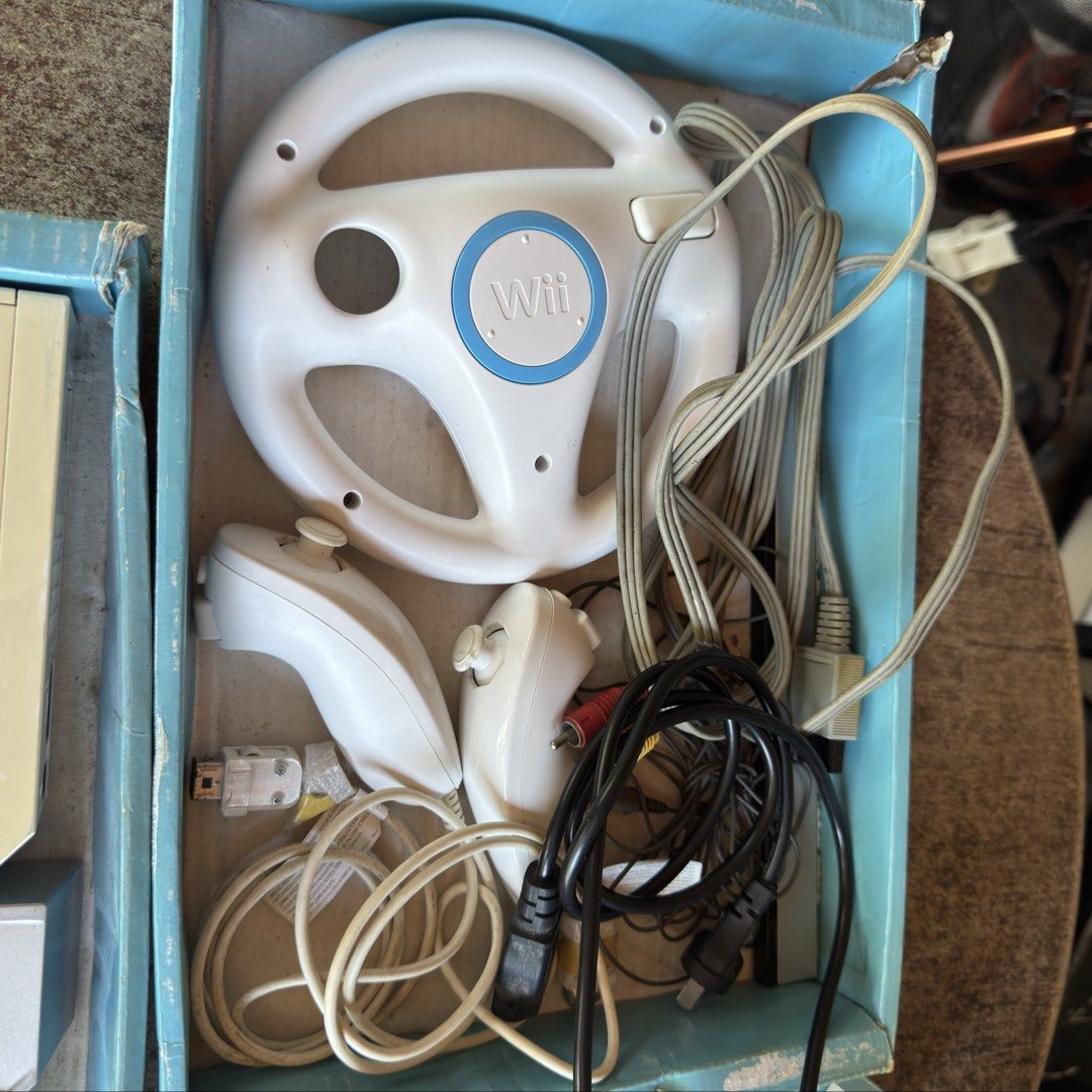 Nintendo Wii Console Bundle with Wheel and Resident Evil (Category: Nintendo) located in Cuyapo. Submitted by blacksheepshop (Listing ID 1466180274, Image 2). Description: AS IS, MAY POWER.