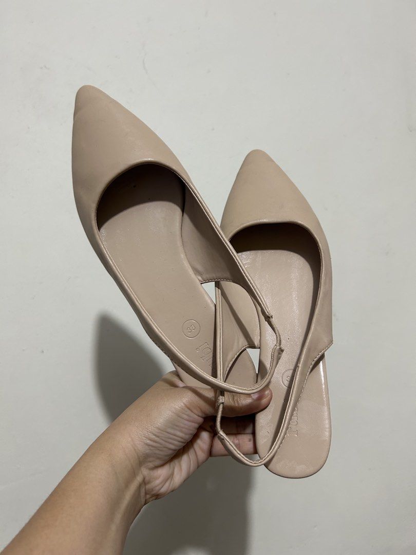 Nude Pointed Toe Slingback Flats Size 38 (Category: Flats & Sandals) located in Makati City. Submitted by charavelasco (Listing ID 1466237930, Image 1). Description: - Style: Nude pointed toe flats with slingback strap - Size: 38 (marked on inner sole) - Comfort: Easy slip-on design with elastic back - Versatility: Neutral shade matches any outfit, ideal for work or daily outings.