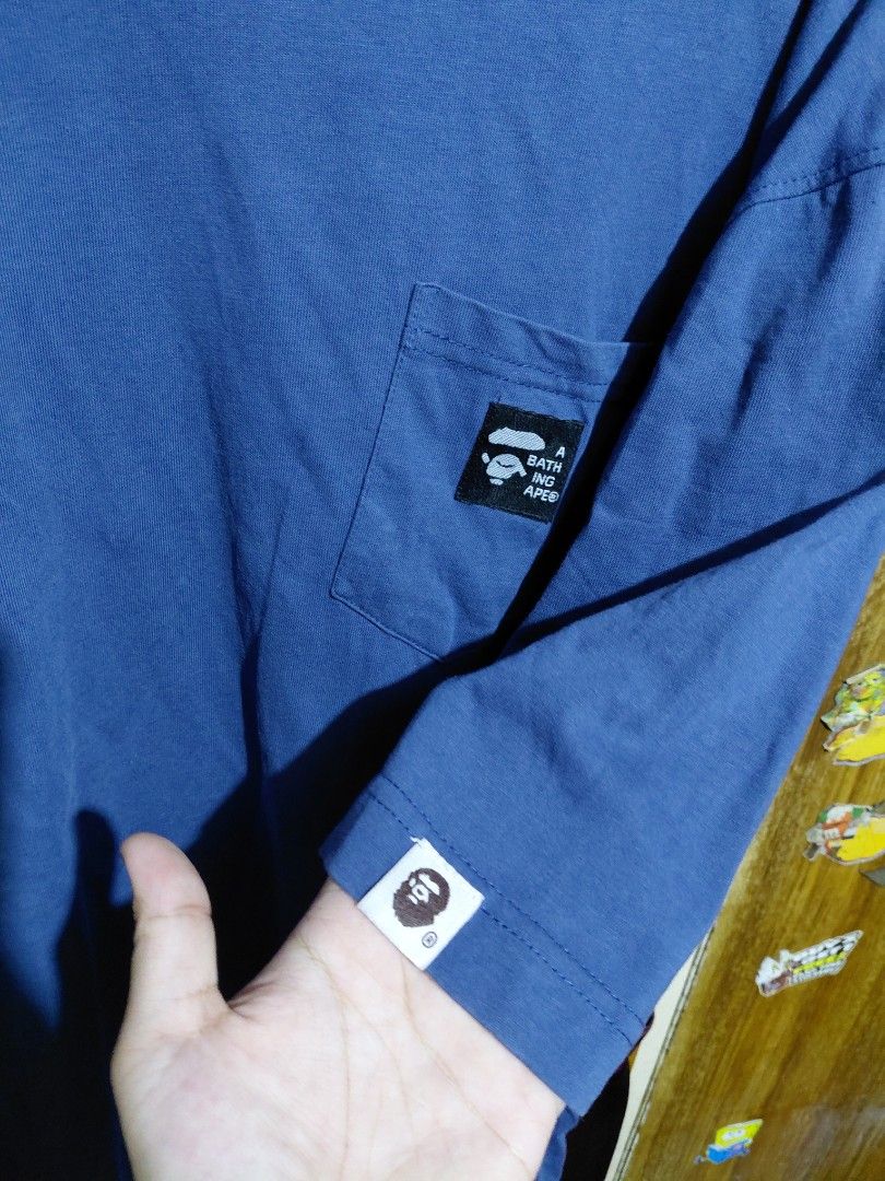 OFF A Bathing Ape Pocket Tee Blue Size XL (Category: Tshirts & Polo Shirts ) located in Imus. Submitted by frootiloots4103 (Listing ID 1466313216, Image 2). Description: - Brand: A Bathing Ape (BAPE) - Color: Blue - Size: XL (Measures 22" pit-to-pit by 29" length) - Details: Chest pocket with brand tag, small sleeve logo - Quality: Thick collar, great weight, clean fabric - Condition: Excellent daily streetwear basic OPEN FOR NEGO (best if aspack