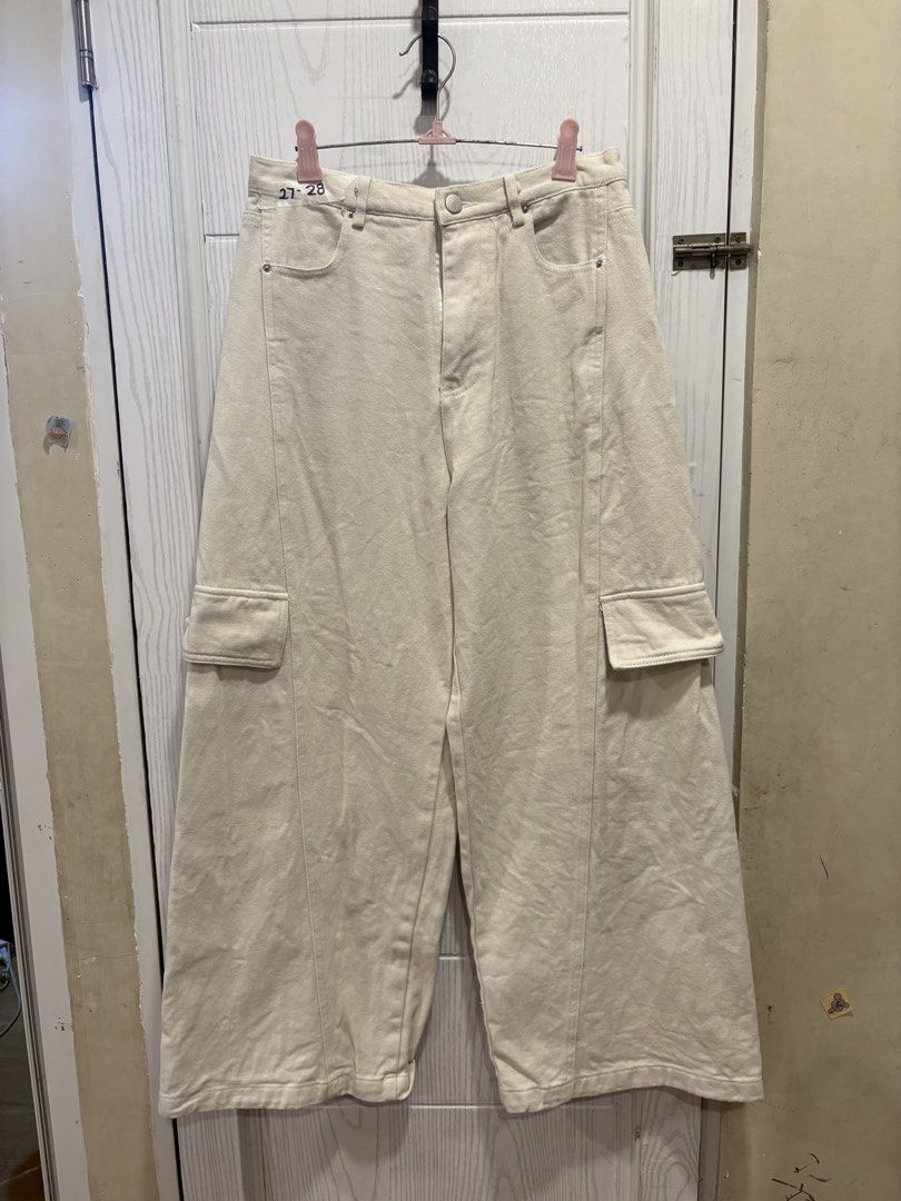 Off-white Cargo Pants Size 27-28 (Category: Jeans) located in Mandaluyong City. Submitted by shopwithjuu (Listing ID 1466161848, Image 1). Description: Off-white wide-leg cargo pants in size 27-28. Features utility pockets, a relaxed fit, and a neutral cream shade that pairs easily with any top..
