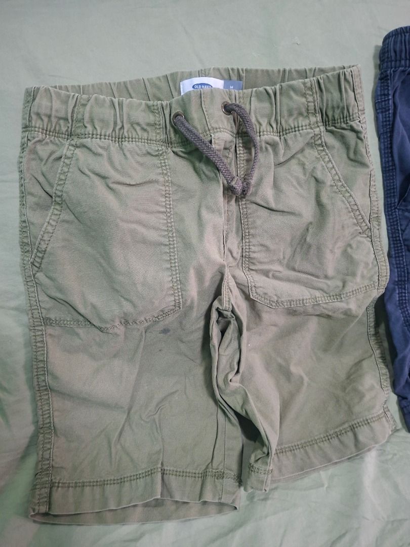 Old Navy Boys Shorts Bundle Olive Green Blue (Category: Babies & Kids Fashion) located in General Trias. Submitted by lonzocorner (Listing ID 1466231754, Image 2). Description: Size: 8-10Y Old Navy boys shorts bundle (Size M). Includes one olive green and one blue pair. Features an elastic drawstring waist, deep pockets, and comfy cotton blend. Great for everyday play from a smoke-free home..