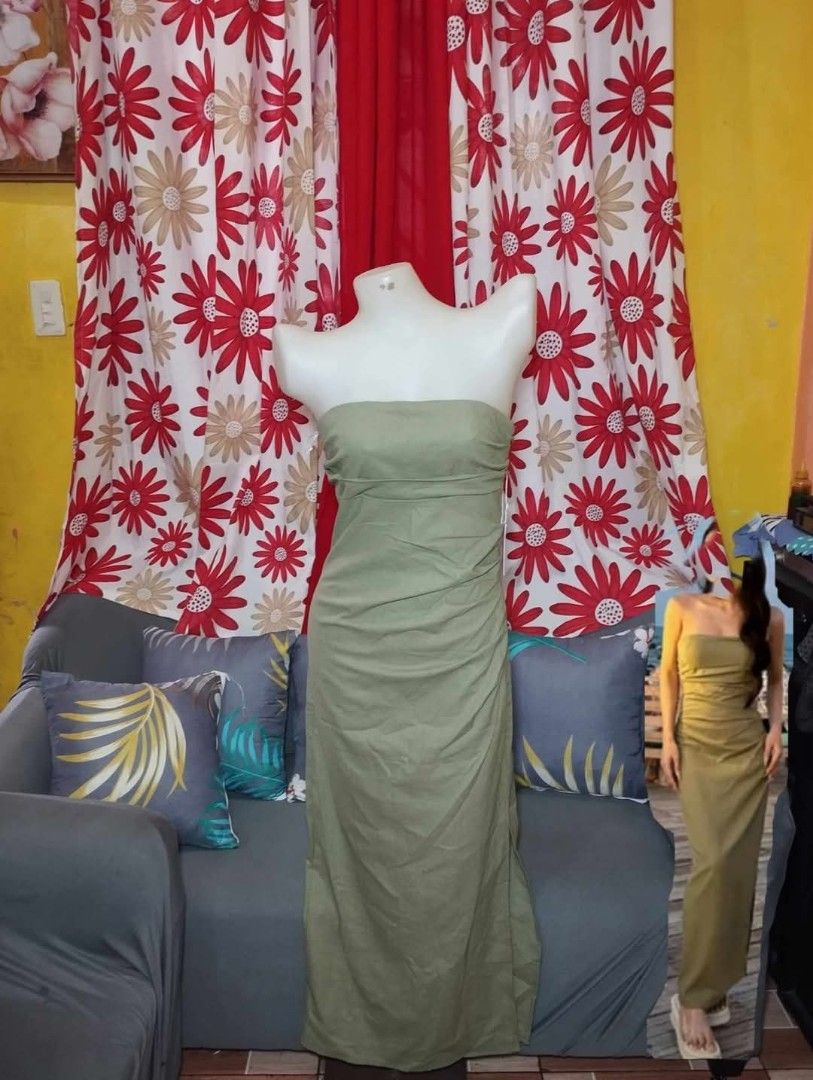 Olive Green Strapless Maxi Dress (Category: Dresses) located in Manila. Submitted by kristinegloria (Listing ID 1466196370, Image 2). Description: - Color: Olive green - Style: Strapless maxi dress with fitted bodice and ankle-length skirt - Details: Flattering subtle side ruching down the front - Versatility: Perfect for vacations, romantic dinners, or beach outings - Styling: Pairs effortlessly with both sandals and heels - Closure: Easy slip-o