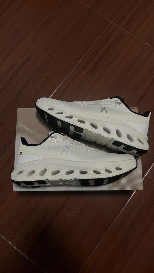 On Cloudtilt CloudTec Phase White Black Running Shoes Size 8.5 (Category: Sneakers) located in Manila. Submitted by cansitcanton (Listing ID 1466255093, Image 1). Description: - Brand: On Cloudtilt - Color: White & Black - Size: 8.5 US - Condition: Brand new, never worn out, pristine condition - Tech: CloudTec Phase midsole technology for ultimate cushioning - Inclusion: Original box included.