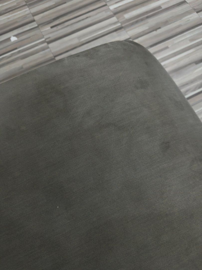 One Seater Grey Fabric Sofa (Category: Sofas) located in Makati City. Submitted by iamlizzh (Listing ID 1466329316, Image 2). Description: - Dark grey 1 seater fabric sofa - Soft textured upholstery featuring stylish visible stitching - Compact size, ideal for small living rooms or studio apartments - Shows normal signs of previous ownership on the fabric surface - Needs cleaning 2 pcs available 500 each .