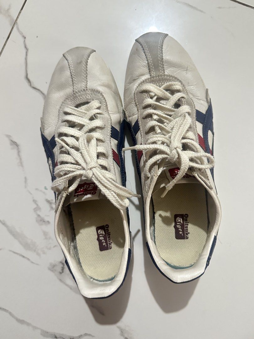 Onitsuka Tiger Runspark (Category: Sneakers) located in Rizal. Submitted by miss2lyps (Listing ID 1466191021, Image 3). Description: - bought 3 years ago, with signs of usage BUT STILL USEABLE. - with slight bakbak sa may color blue na part, please see 5th pic. - soles still in good condition..