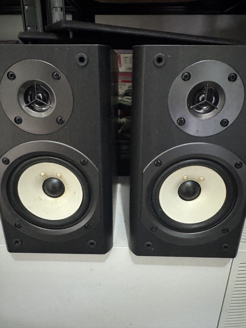 Onkyo D-035 Bookshelf Speakers Pair (Category: Soundbars, Speakers & Amplifiers) located in Cavite. Submitted by marcuz1316 (Listing ID 1466253775, Image 1). Description: - Brand: Onkyo - Model: D-035 (Made in Malaysia) - Color: Black housing with striking white woofer cones and dome tweeters - Specs: 4 ohms impedance, 40W max power handling - Condition: Tested and working 100% fine - Inclusions: Original front grilles with metal Onkyo badges.