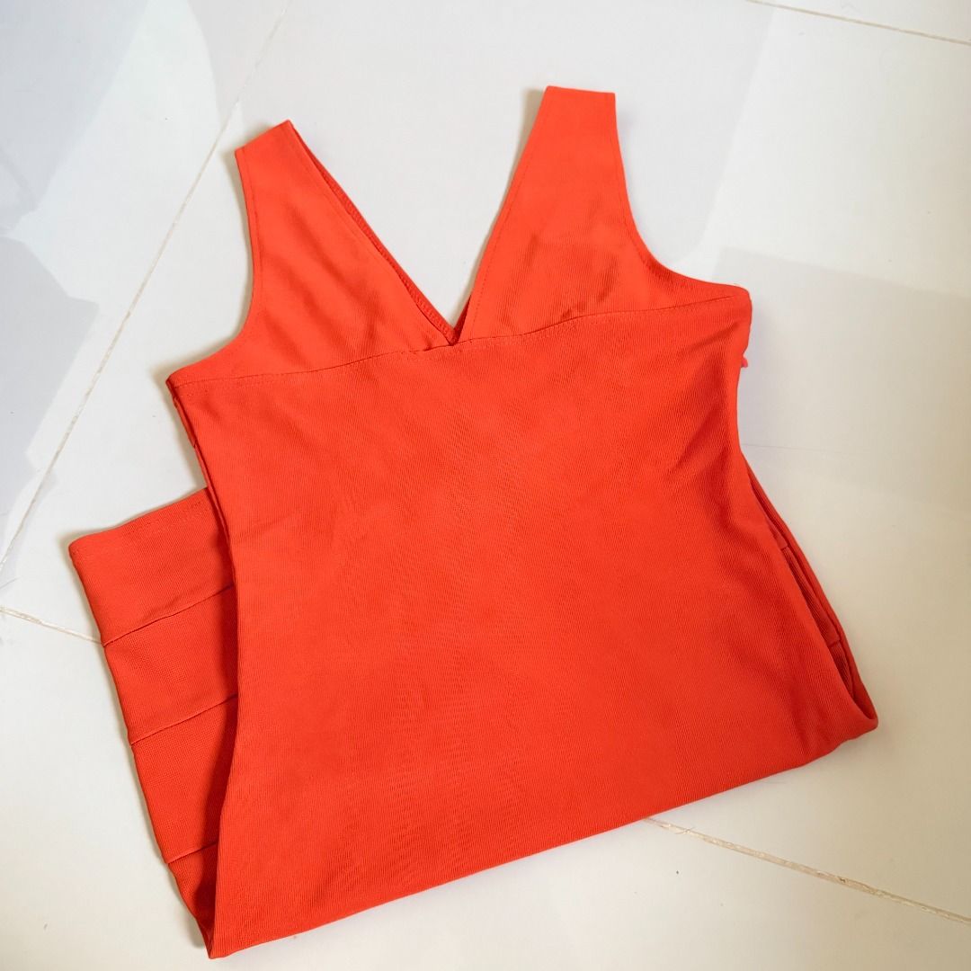 Orange Fitted Dress V-Neck (Category: Dresses) located in Baliuag. Submitted by dubu.preloved (Listing ID 1466289655, Image 2). Description: Orange Fitted Dress V-Neck Bodycon ✨ Condition: 8/10 📏 Size: XS-S 🚚 Shipping available via JNT/Flash 📍 Meet-up: Baliuag, Bulacan.