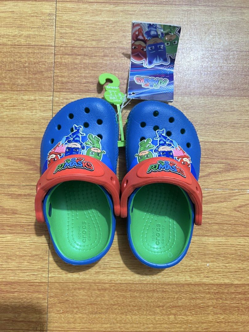 Original crocs x Pj Mask clog c7 (Category: Babies & Kids Fashion) located in Manila. Submitted by baeshop16 (Listing ID 1466323227, Image 2). Description: Brandnew w tags C7 No haggling fixed price. Below srp.