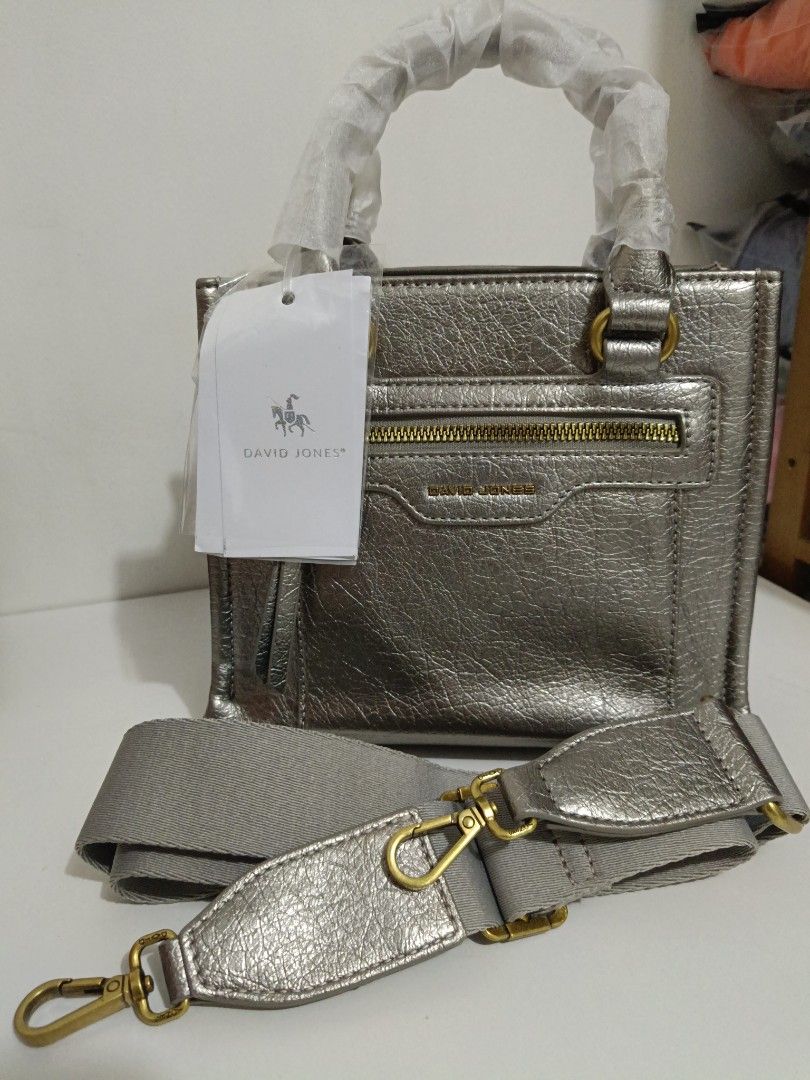 Original David Johnsons Sling (Category: Cross-body Bags) located in Manila. Submitted by byjrb (Listing ID 1466323226, Image 1). Description: Onhand. Ready to ship/book via Courier and Lalamove for same day delivery. Payment first NO COD/COP Sf only. MOP Gcash.