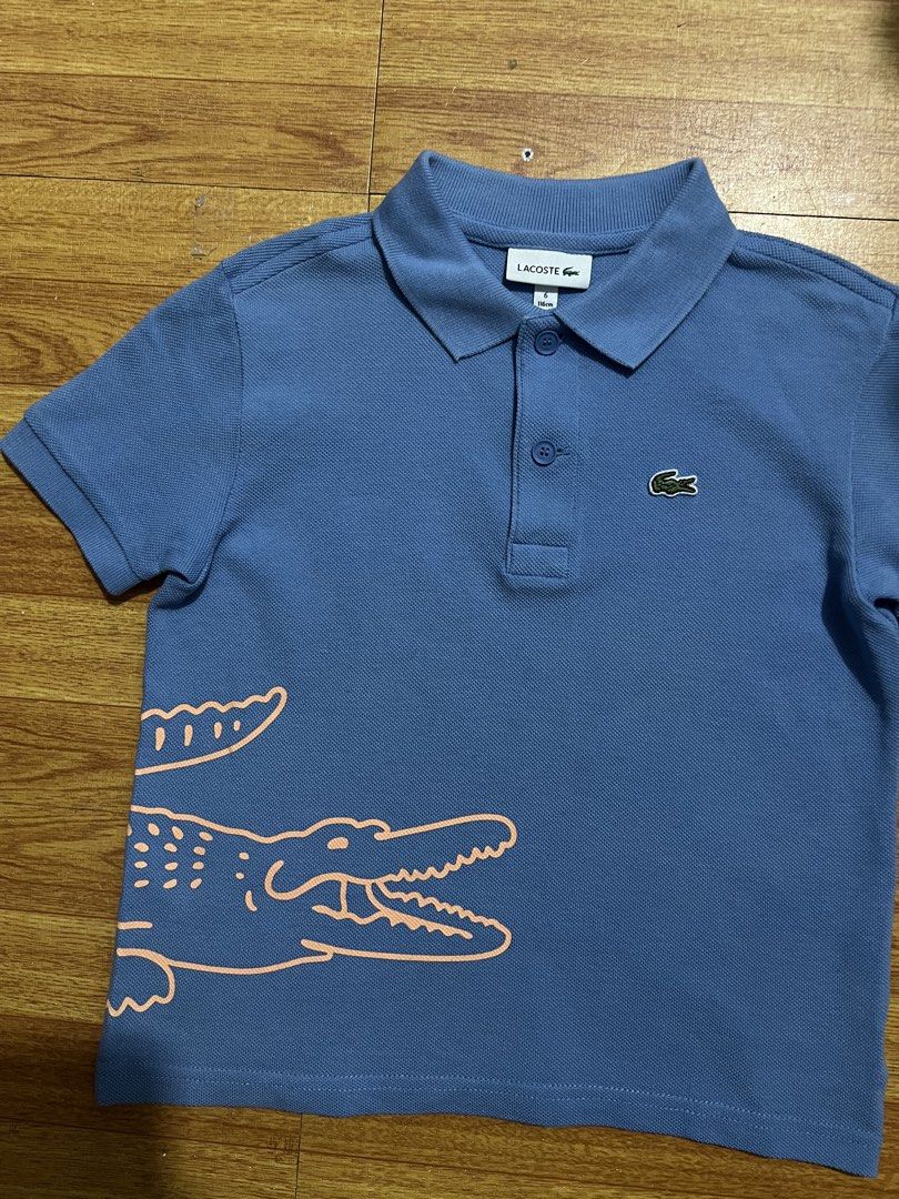 Original lacoste polo shirt (Category: Babies & Kids Fashion) located in Manila. Submitted by baeshop16 (Listing ID 1466324331, Image 2). Description: Likenew 6a No issue.