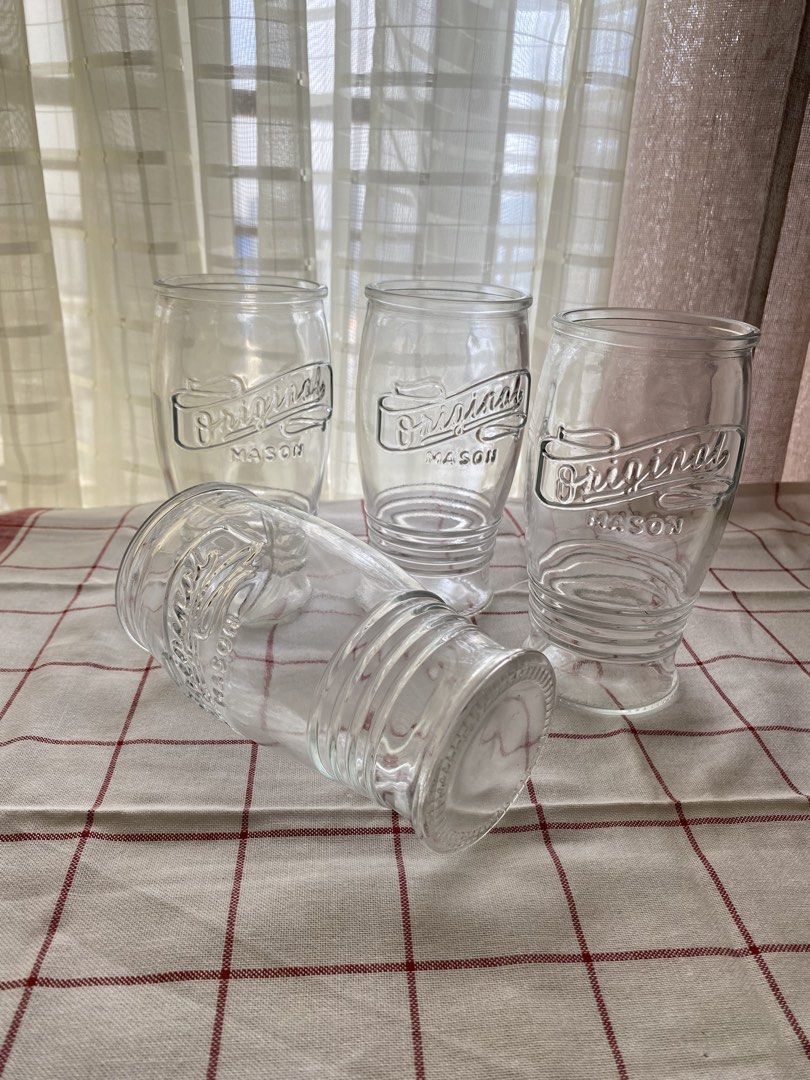 Original Mason Drinking Glasses Set of 4 (Category: Dinnerware & Cutlery) located in Mandaluyong City. Submitted by lovegood711 (Listing ID 1466159313, Image 2). Description: A nice addition to your drink ware for the holidays or for unwinding on the weekends with a cold glass of beer or your favorite iced tea, milk tea, cold coffee beverage, soda or just plain, cold water. - Set of 4 clear glass drinkware pieces - Features embossed 'Original Mas