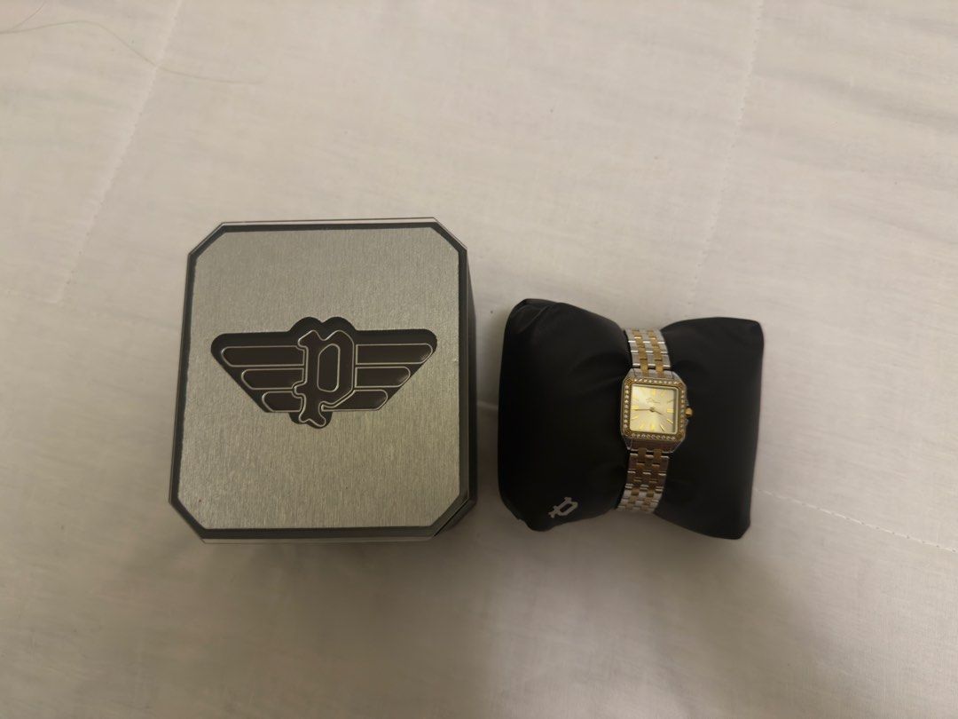 Original Police two-tone watch (Category: Women's Watches) located in Paranaque City. Submitted by posh.mnl08 (Listing ID 1466329889, Image 3). Description: Original With box Good condition .