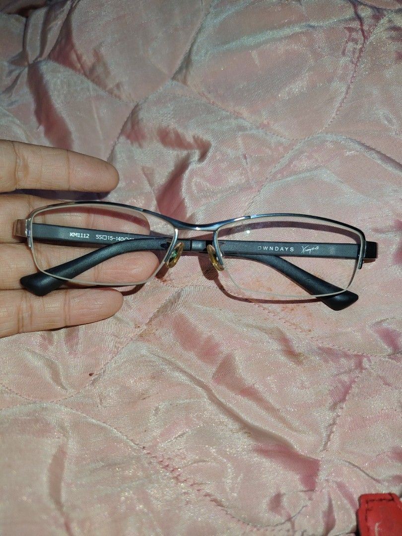 OWNDAYS KM1112 Eyeglasses Frames (Category: Sunglasses & Eyewear) located in Manila. Submitted by purediamond888 (Listing ID 1466307906, Image 2). Description: OWNDAYS frames, model KM1112. Measurements stamped on the arm: 55-15-140. Black arms with silver top frame and clear lower half. Nose pads attached. Good backup pair or ready for prescription lenses..