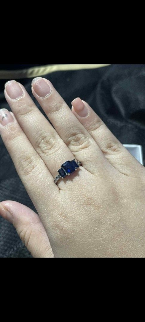 Pandora Blue Crystal Three-Stone Ring (Category: Rings) located in Pasig City. Submitted by magic5 (Listing ID 1466295856, Image 3). Description: - Brand: Authentic Pandora - Material: 925 Sterling Silver (stamped inside band) - Center Design: Three deep blue rectangular stones - Accents: Paved clear stones along the band - Inclusion: Original white Pandora presentation box with black insert - Condition: Excellent, comfortable to wear with striki