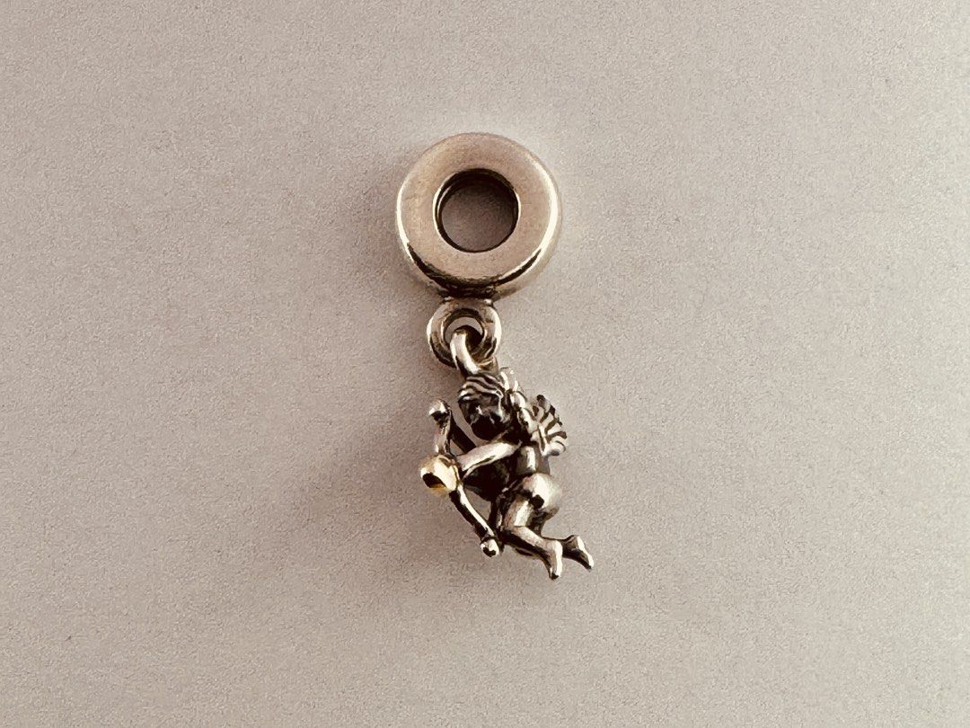 Pandora Cupid Pendant Dangle Charm (791251) (Category: Charms) located in Cabanatuan. Submitted by water.withahintoflime (Listing ID 1461261070, Image 3). Description: Retired|Authentic S925 Body|Yellow G585 Arrowhead PANDORA|S925 ALE Hallmark Pre-owed|No issue|Normal wear With complete packaging .