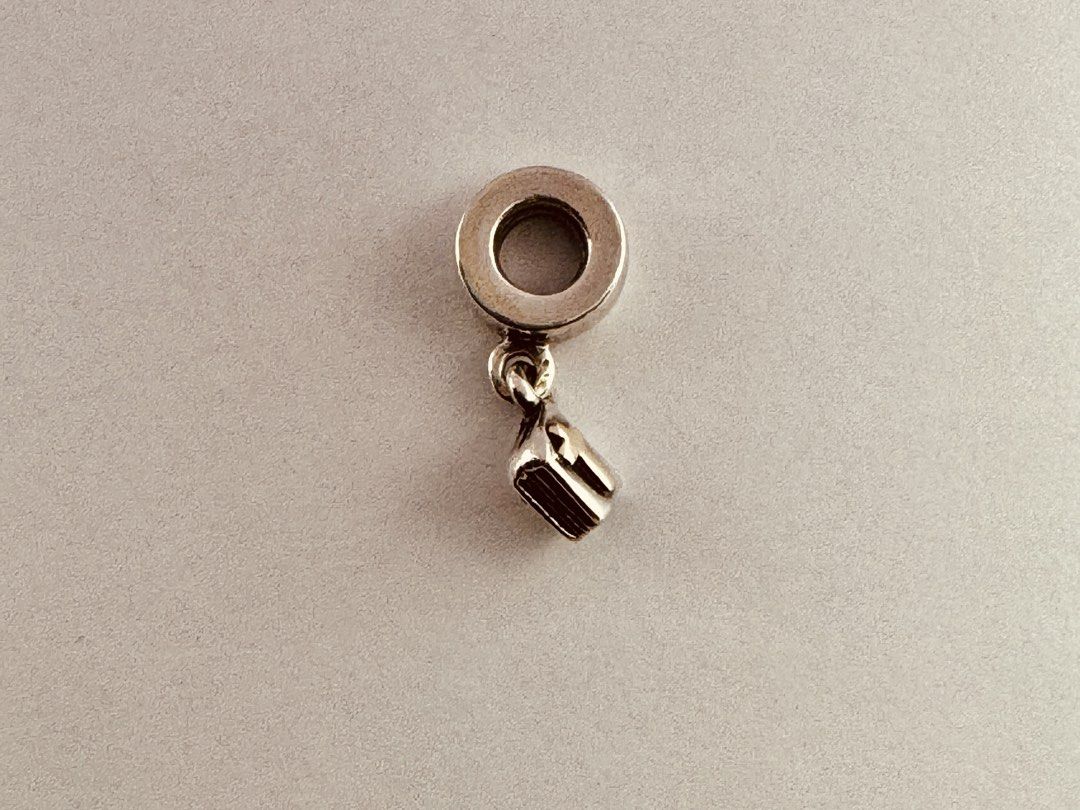 Pandora Holy Bible Dangle Charm (790409) (Category: Charms) located in Cabanatuan. Submitted by water.withahintoflime (Listing ID 1461262487, Image 2). Description: Retired|Authentic Rare S925 Body|Yellow G585 Cross (both sides) 925 ALE Hallmark Pre-owed|No issue|Normal wear With complete packaging.