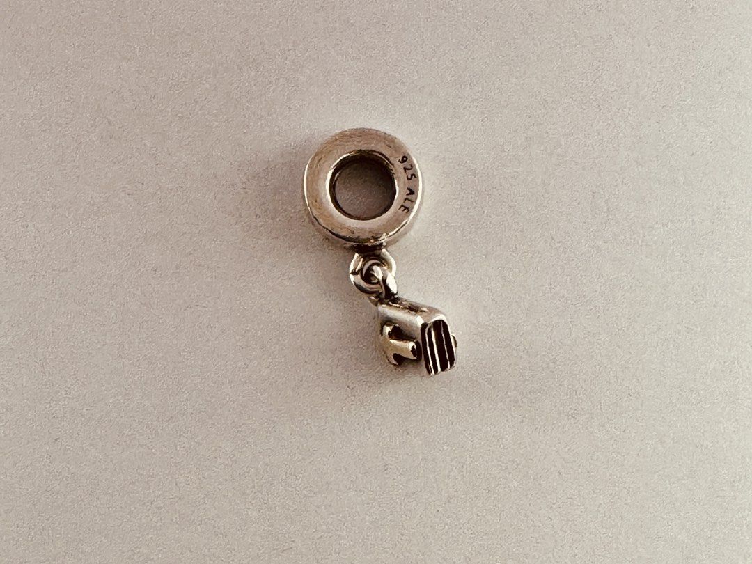 Pandora Holy Bible Dangle Charm (790409) (Category: Charms) located in Cabanatuan. Submitted by water.withahintoflime (Listing ID 1461262487, Image 3). Description: Retired|Authentic Rare S925 Body|Yellow G585 Cross (both sides) 925 ALE Hallmark Pre-owed|No issue|Normal wear With complete packaging.