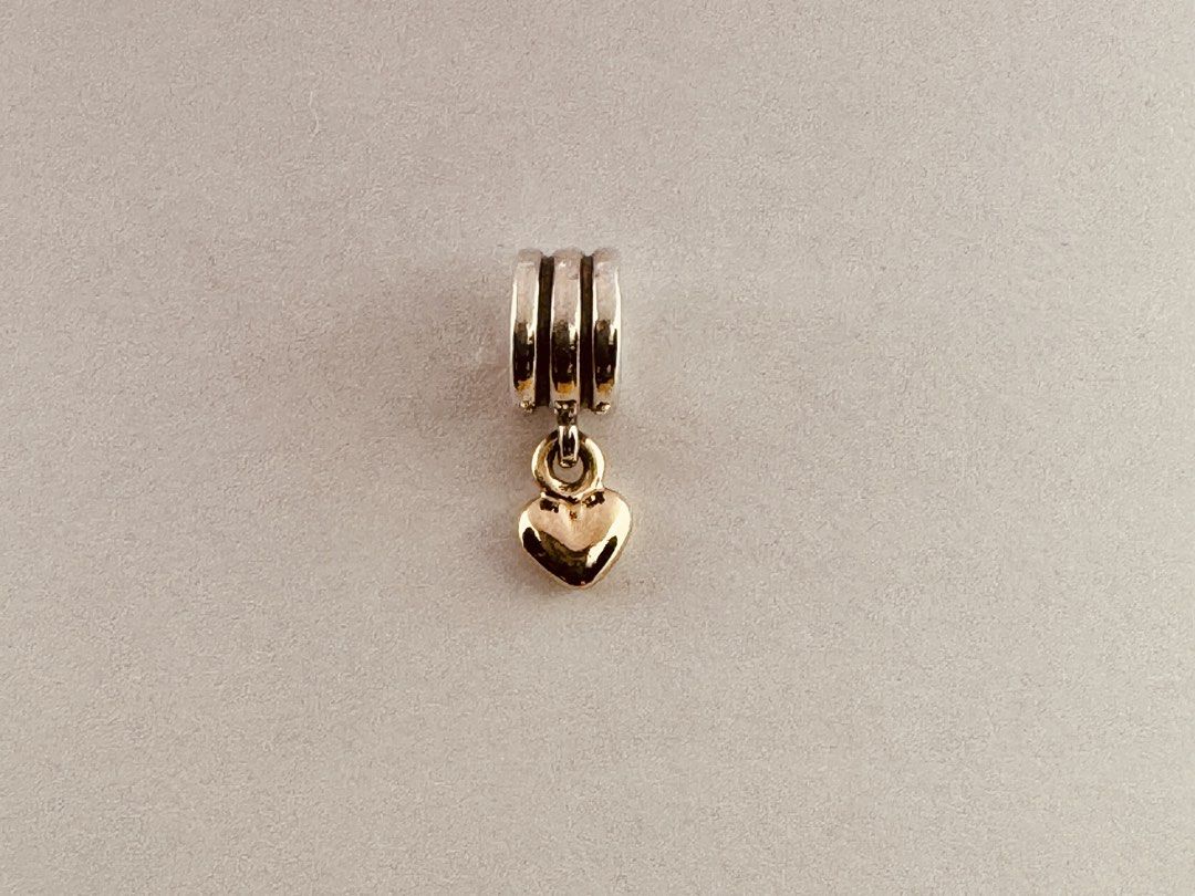 Pandora Puffed Heart Dangle Charm (790173) (Category: Charms) located in Cabanatuan. Submitted by water.withahintoflime (Listing ID 1461251159, Image 1). Description: Retired|Authentic Collector’s Piece S925 Bail|Solid Yellow G585 Heart 925 ALE Hallmark Pre-owed|Rubbed off Hallmark|Normal wear With complete packaging .