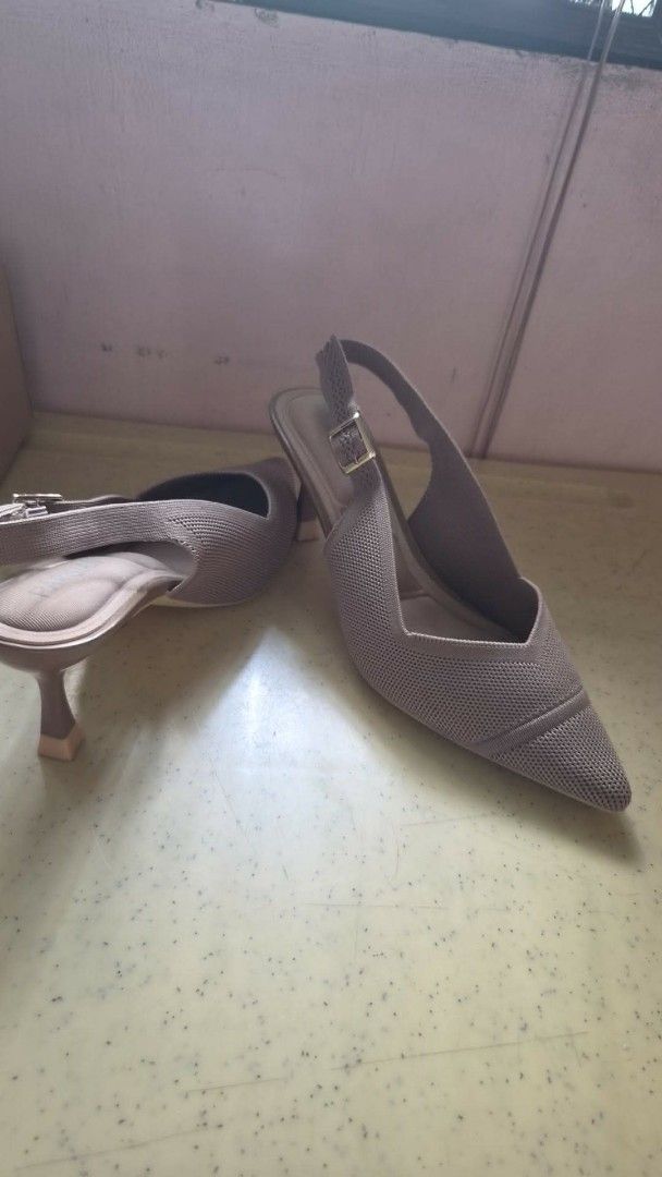Parisian Vera Slingback Heels Mocha Size 8 (Category: Heels) located in Manila. Submitted by stuff.gaming (Listing ID 1466209900, Image 3). Description: - Brand: Parisian - Style: Vera Slingback Heels - Color: Mocha - Size: 38 EUR / 8 USA - Material: Knitted textured upper - Heel: Slender kitten heel with pointed toe - Closure: Adjustable slingback strap with buckle - Inclusions: Comes with original box Price still negotiable Shipping to be shoul
