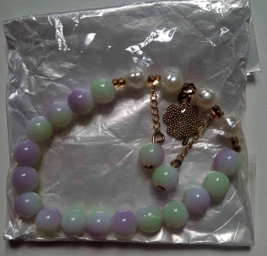 Pastel Beaded Bracelet with Four-Leaf Clover Charm (Category: Bracelets) located in Taguig. Submitted by fits.for.less (Listing ID 1466162343, Image 2). Description: 60 pesos MOP: Gcash MOD: lalamove/grab, pick-up if malapit lang.