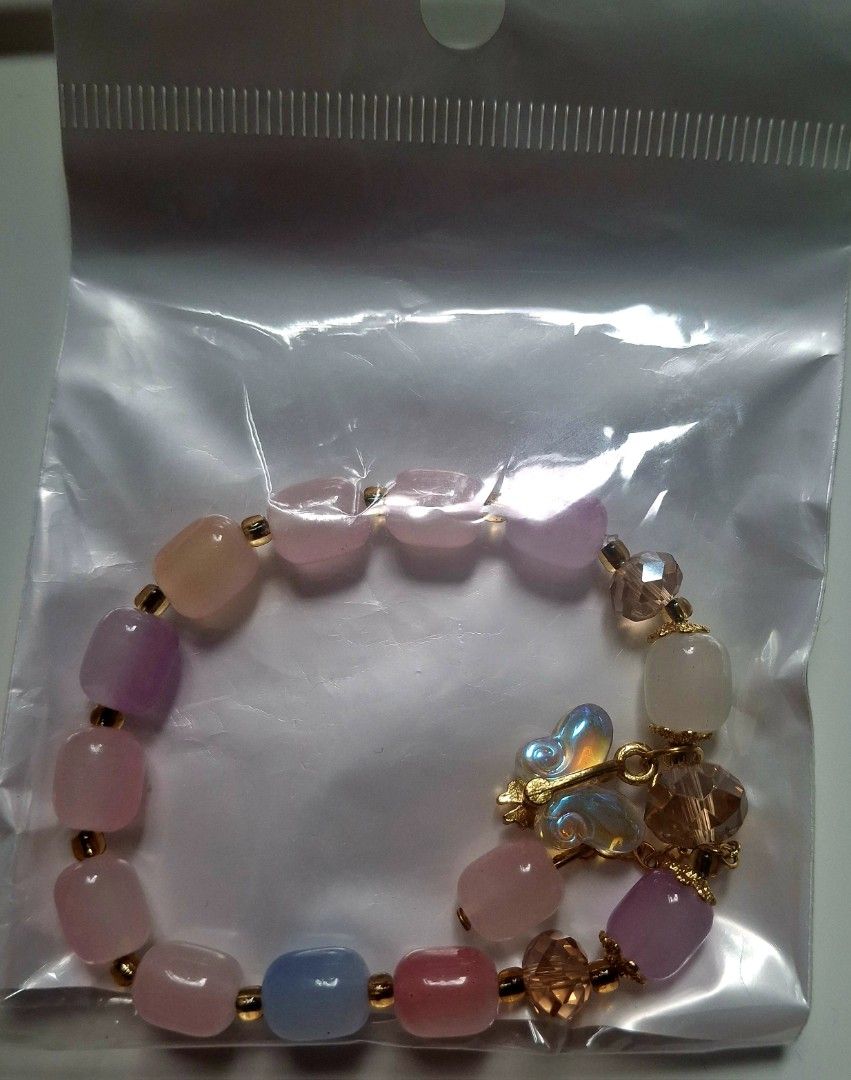 Pastel Beaded Butterfly Charm Bracelet (Category: Bracelets) located in Taguig. Submitted by fits.for.less (Listing ID 1466165766, Image 1). Description: 60 pesos MOP: Gcash MOD: lalamove/grab, pick-up if malapit lang.