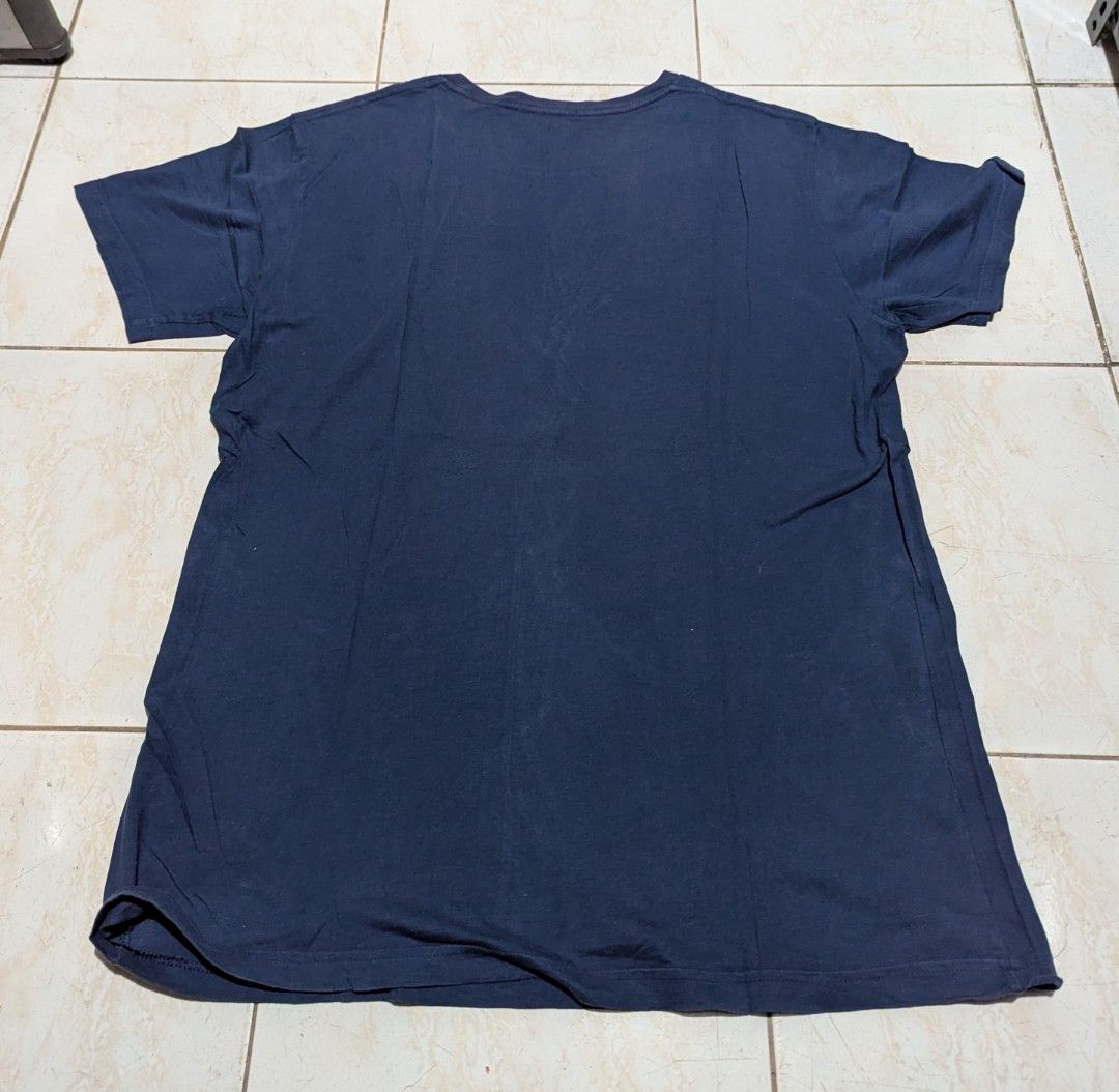Patagonia (Category: Tshirts & Polo Shirts ) located in Malabon City. Submitted by doobidoi (Listing ID 1466217625, Image 2). Description: - Brand: Patagonia - Color: Dark Navy Blue - Size: Large (Slim Fit) - Width: 21" - Length: 29" - Good condition DM if interested Salamat.