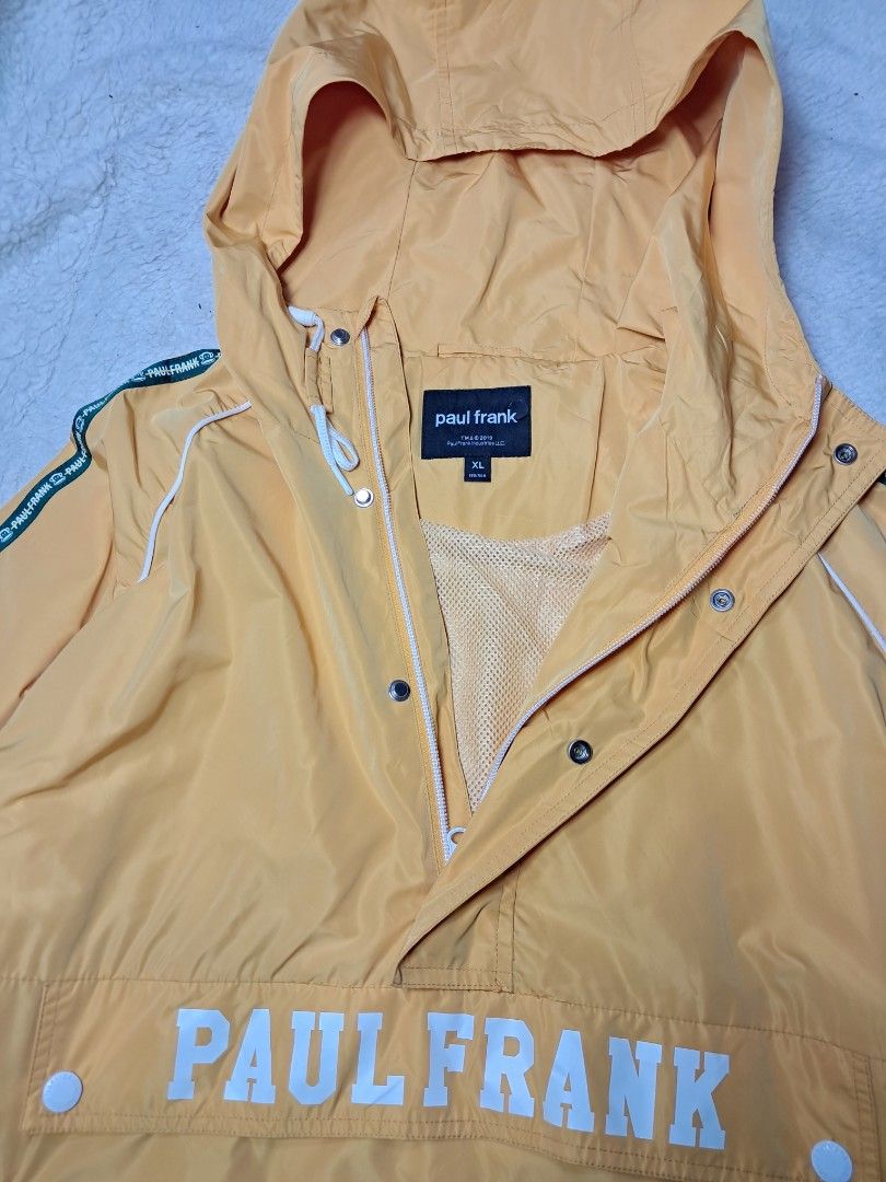 Paul frank unisex anorak jacket (Category: Coats, Jackets and Outerwear) located in Baguio. Submitted by mishmashfritz (Listing ID 1466163823, Image 3). Description: like new, thrifted needs wash, no flaws, one side zippered, adjustable hem, 2 front pockets, water repellent, with lining, l to xl,.