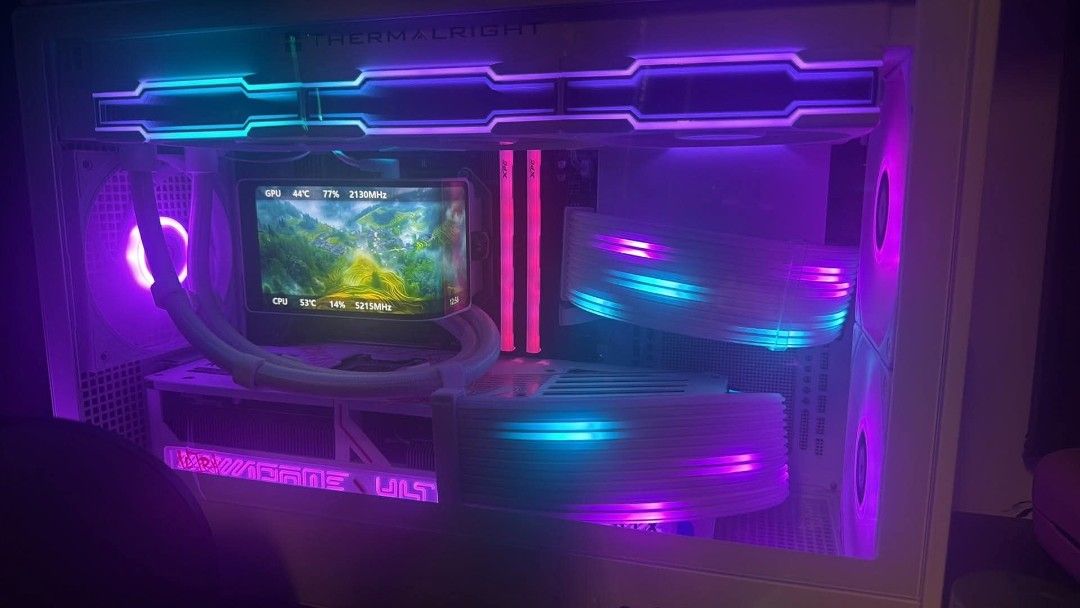 PC (Category: Desktops) located in Rizal. Submitted by janeyca07 (Listing ID 1466274262, Image 3). Description: - Processor: AMD Ryzen 7 9800X3D 8-Core - Graphics Card: NVIDIA GeForce RTX 5080 - Memory: 32GB XPG RAM @ 6000 MT/s - Motherboard: B650M GAMING X WIFI6E - Cooling: Liquid cooling with Thermalright CPU display block - OS: Windows 11 Pro - Aesthetics: Clean white setup, glass side panel, RGB fans and illuminated cables.