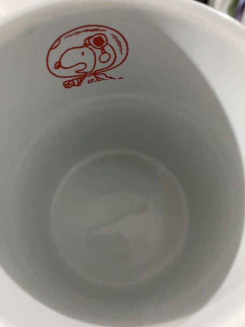 Peanuts KFC 2022 Snoopy Chef Ceramic Mug (Category: Coffee & Tea Tableware) located in Imus. Submitted by just.randoms (Listing ID 1466313793, Image 2). Description: - Official 2022 Peanuts Worldwide LLC & KFC collaboration - Colorful polka dot design with Chef Snoopy and friends - Cute red Snoopy graphic print on the inner rim - Official branding stamp on the bottom - Standard size, perfect for coffee or tea - Clean inside and out, ready to use.