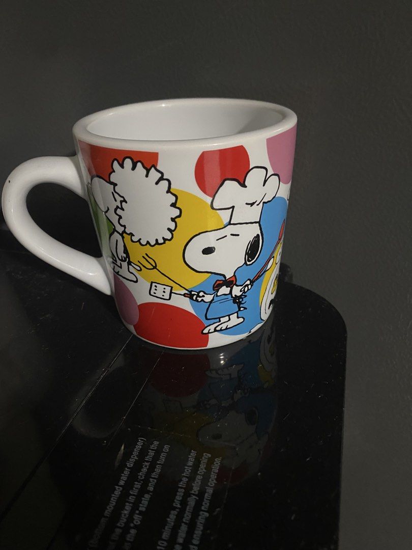 Peanuts KFC 2022 Snoopy Chef Ceramic Mug (Category: Coffee & Tea Tableware) located in Imus. Submitted by just.randoms (Listing ID 1466313793, Image 1). Description: - Official 2022 Peanuts Worldwide LLC & KFC collaboration - Colorful polka dot design with Chef Snoopy and friends - Cute red Snoopy graphic print on the inner rim - Official branding stamp on the bottom - Standard size, perfect for coffee or tea - Clean inside and out, ready to use.