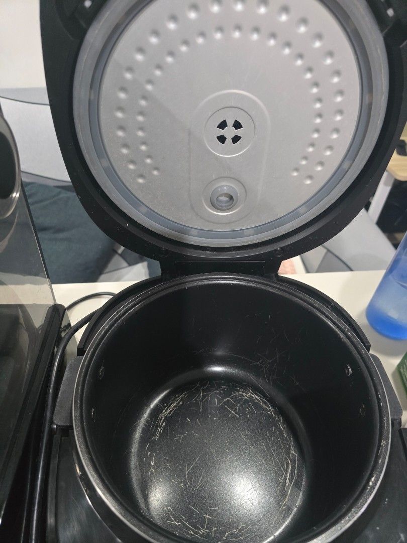 Pear cooker digital display multi-function (Category: Cookers) located in Marikina City. Submitted by happy_haulsph (Listing ID 1466156710, Image 3). Description: - Commercial pearl pot rice cooker with stylish black and metallic silver exterior - Features a digital control panel with multiple cooking modes, timers, and preset options - Powers up successfully with a clear, working LED display screen - Clean inner lid equipped with an intact silic