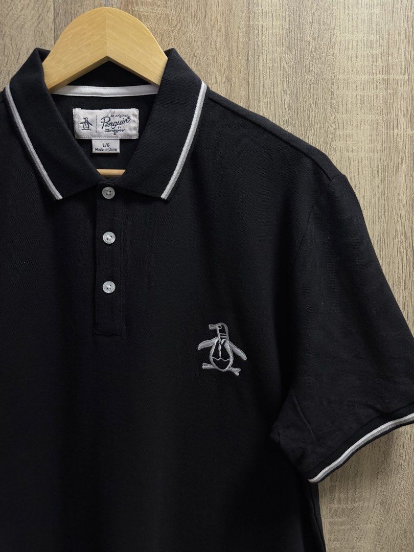 Penguin Polo Shirt (Category: Tshirts & Polo Shirts ) located in Cavite. Submitted by PRIVATE.Selection (Listing ID 1466317224, Image 2). Description: Penguin Polo Shirt Size Large W- 21.5 L- 29 Good as new no issues .