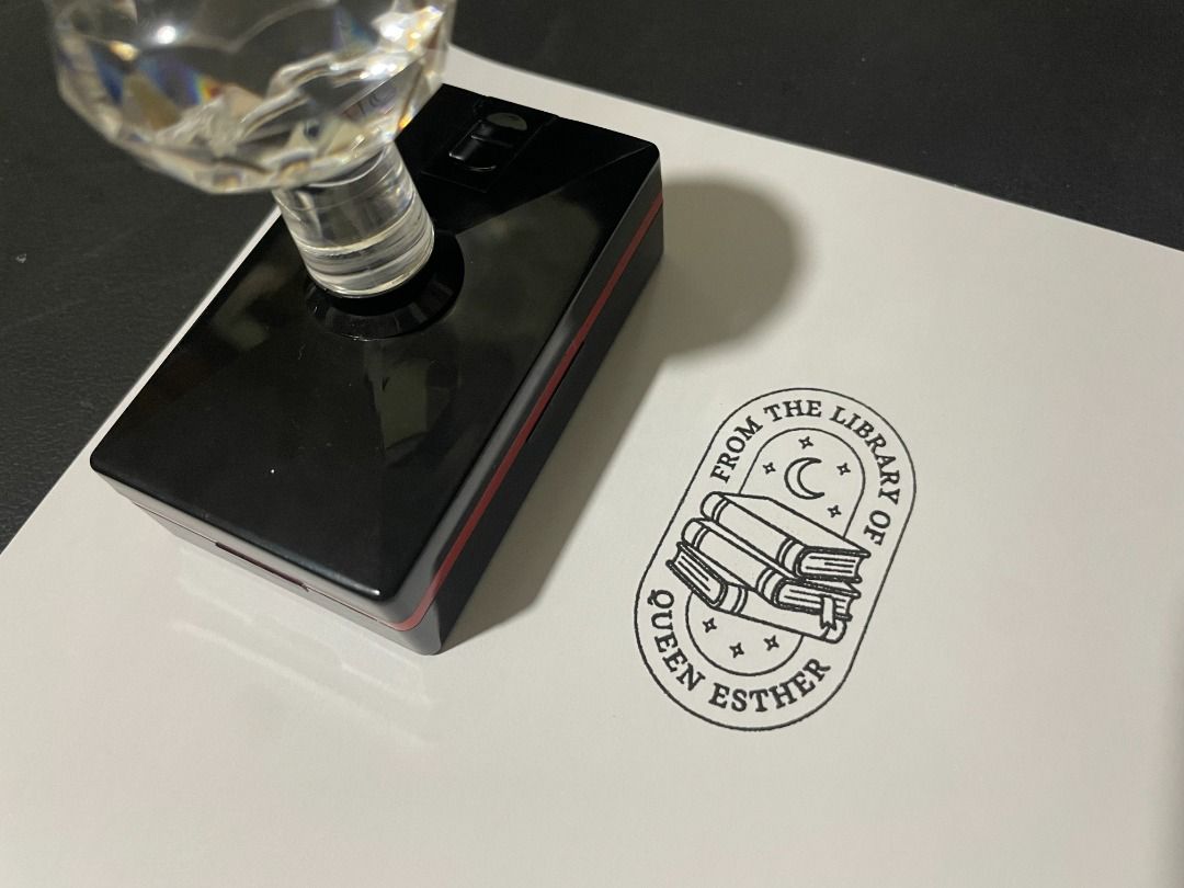 Personalized Book Stamp for Book Lovers (Ex-Libris) (Category: Craft Supplies & Tools) located in Santa Maria. Submitted by declutterose (Listing ID 1466321745, Image 2). Description: Personalized Book Stamp for Your Own Personal Library • Personalized it with your name or someone's name • Self-inking stamp, no need for ink pad • Designs to choose from (see the last 2 photos) • Comes with free ink • 4 Colors to choose from: Black, Red, Blue, and 