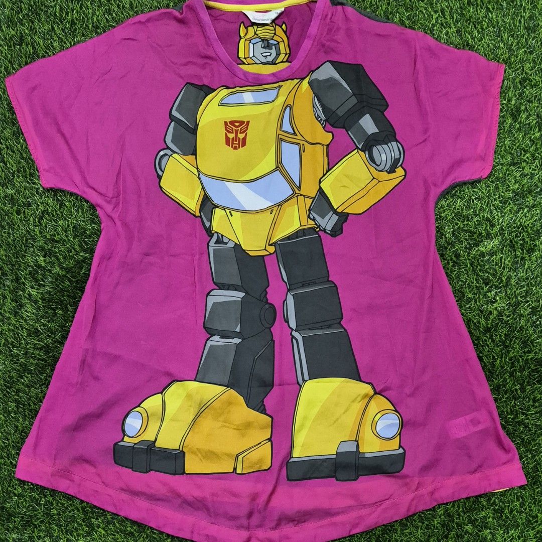 Peter Alexander Transformers G1 Bumblebee Oversized Sleep Tee (Category: Undergarments & Loungewear) located in Antipolo. Submitted by saribymonica (Listing ID 1466307840, Image 2). Description: Peter Alexander Transformers G1 Bumblebee Oversized Sleep Tee Condition: Like New / Used Once Description: Selling a hard-to-find Peter Alexander x Transformers collaboration sleep tee featuring a large classic G1 Bumblebee graphic. Worn only once as a qu
