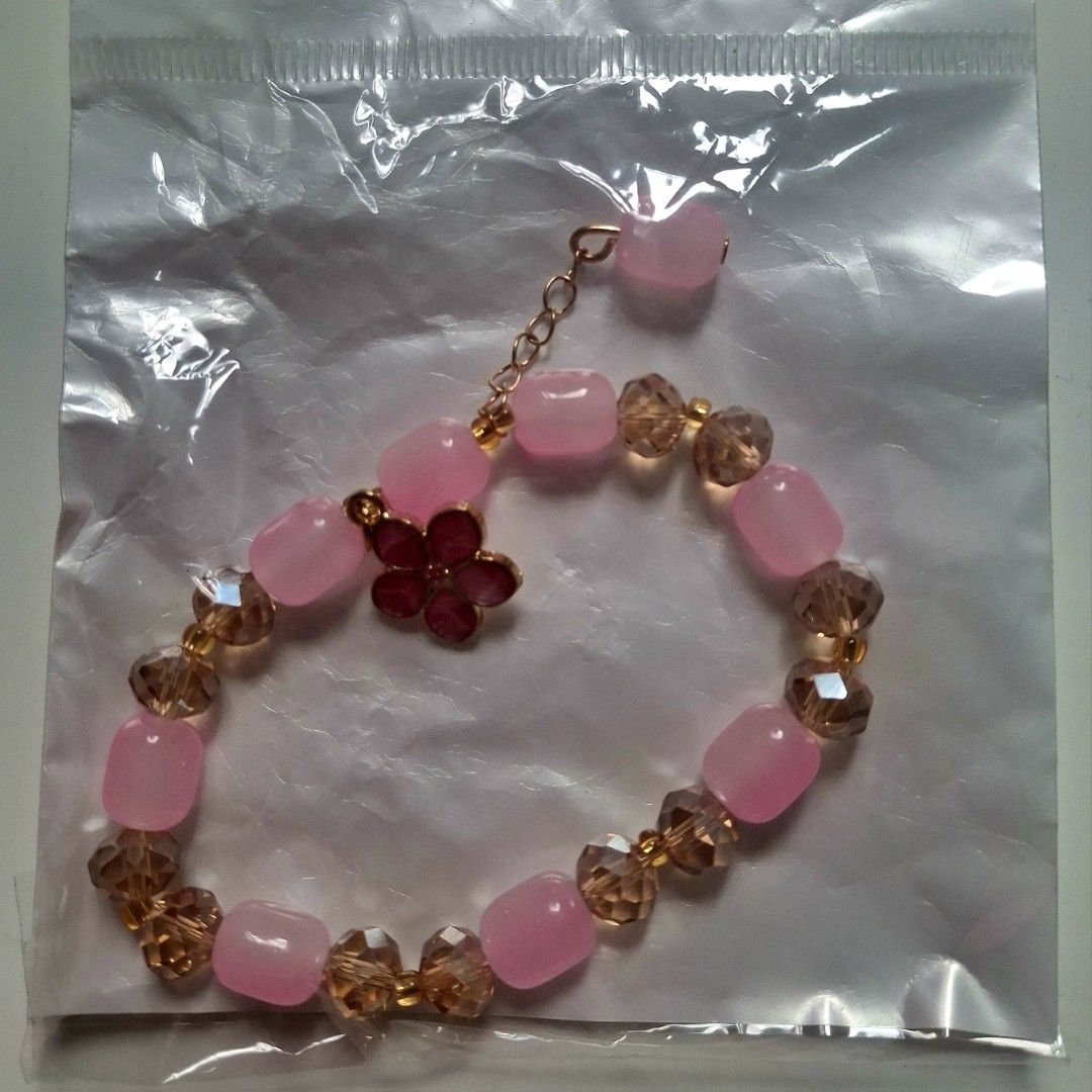 Pink Beaded Bracelet with Cherry Blossom Charm (Category: Bracelets) located in Taguig. Submitted by fits.for.less (Listing ID 1466163003, Image 2). Description: 60 pesos MOP: Gcash MOD: lalamove/grab, pick-up if malapit lang.